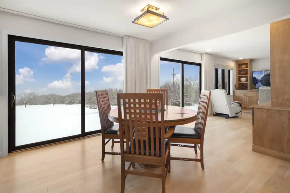 Hector NY home with added-on living space, snowy outdoors visible through windows
