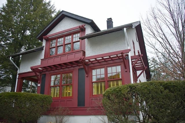 A fresh paint job on a home undergoing exterior remodeling 