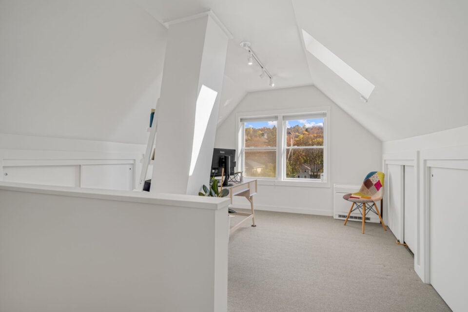 Bright white walls in finished upper level of home