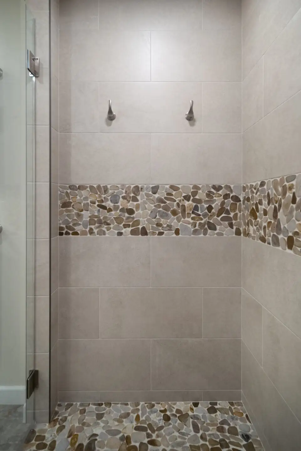Tile shower with towel hooks
