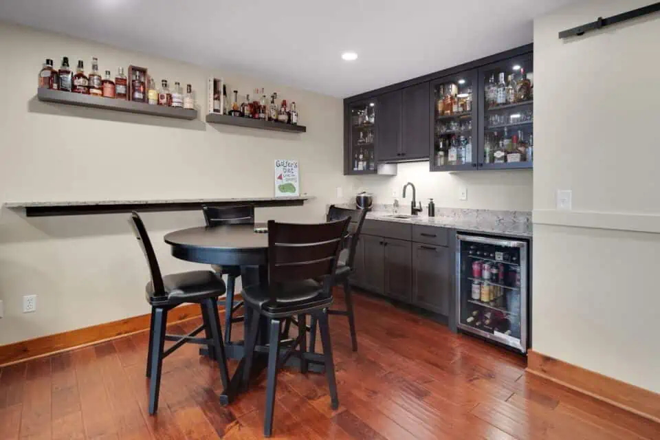 Finished basement with wet bar in the Finger Lakes region of New York State