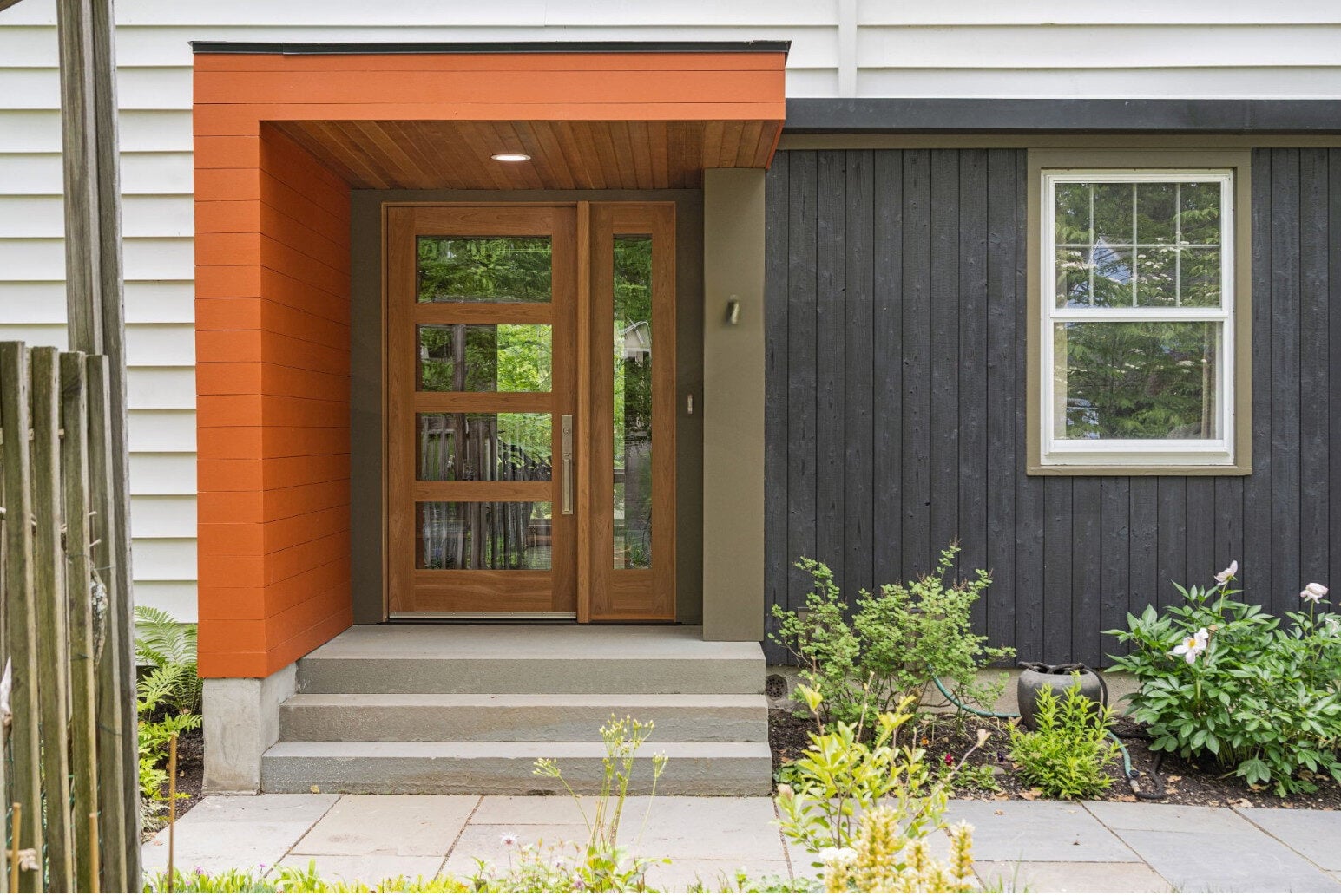 What to Know Before Renovating an Older Ithaca Home 1 Renovated older Ithaca home with new entry addition blending original and updated exterior