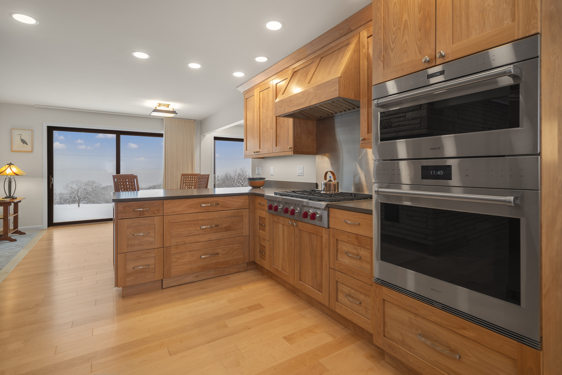 Home addition with wall-mount ovens in kitchen