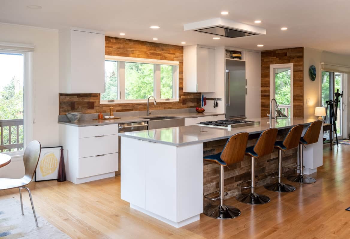 Remodeled kitchen with an island and sitting stools