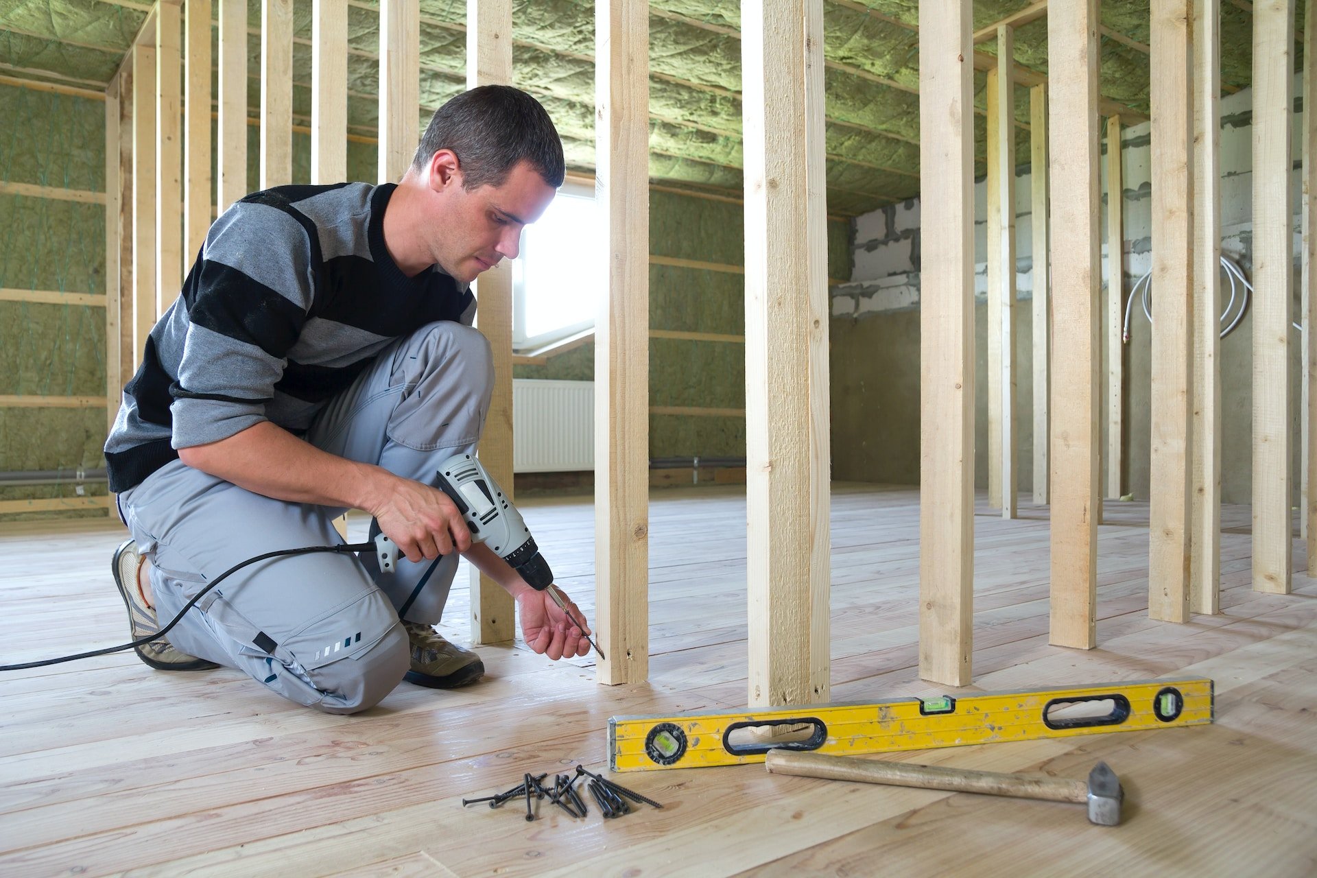 What’s the Difference Between a Home Builder and Remodeler? 1 Kitchen remodel contractor framing wall